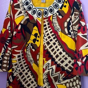 Yellow, black, and red jacket has no hardware for closure. Size medium